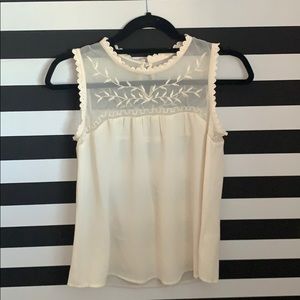 A never worn off white shirt.